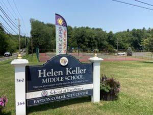 A sign for helen keller middle school in easton.