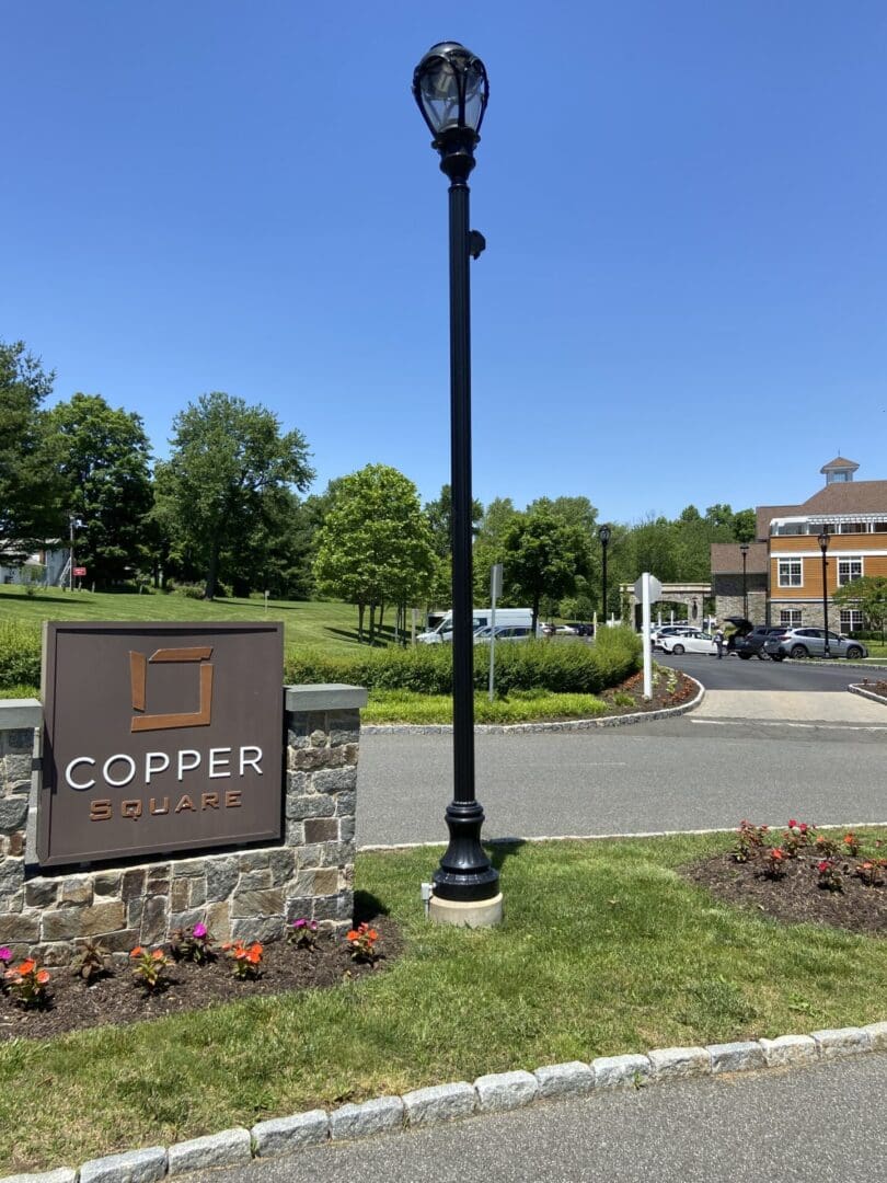 Copper Square entrance with lamp post.