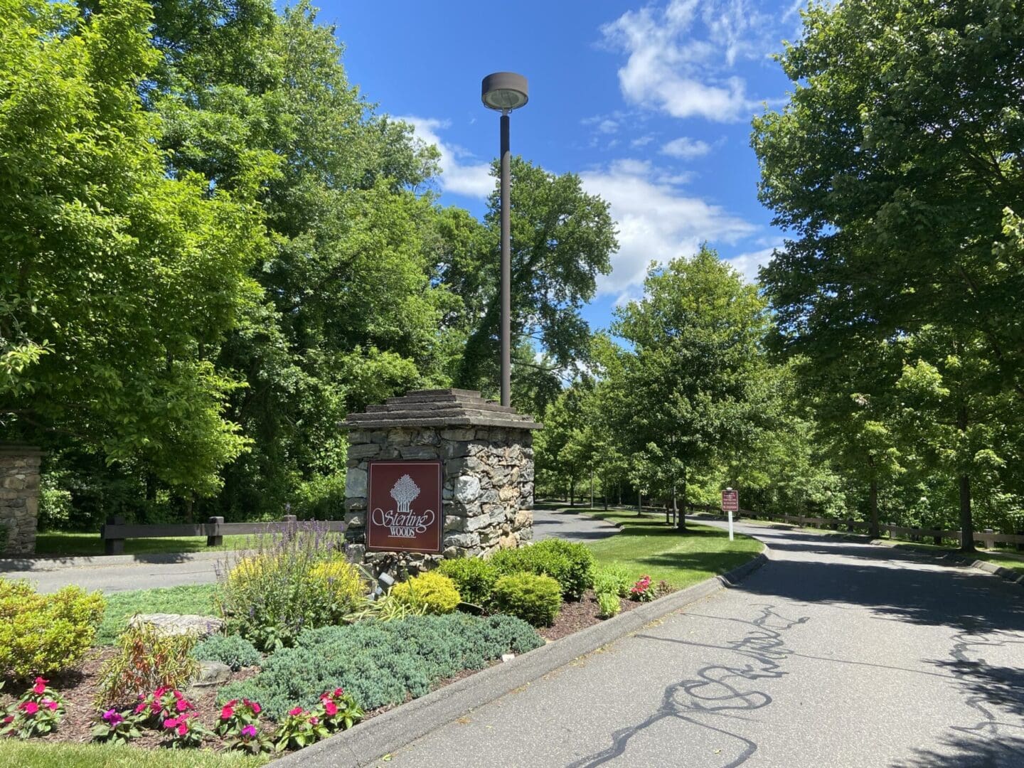 Stone entrance to Sterling Woods community.