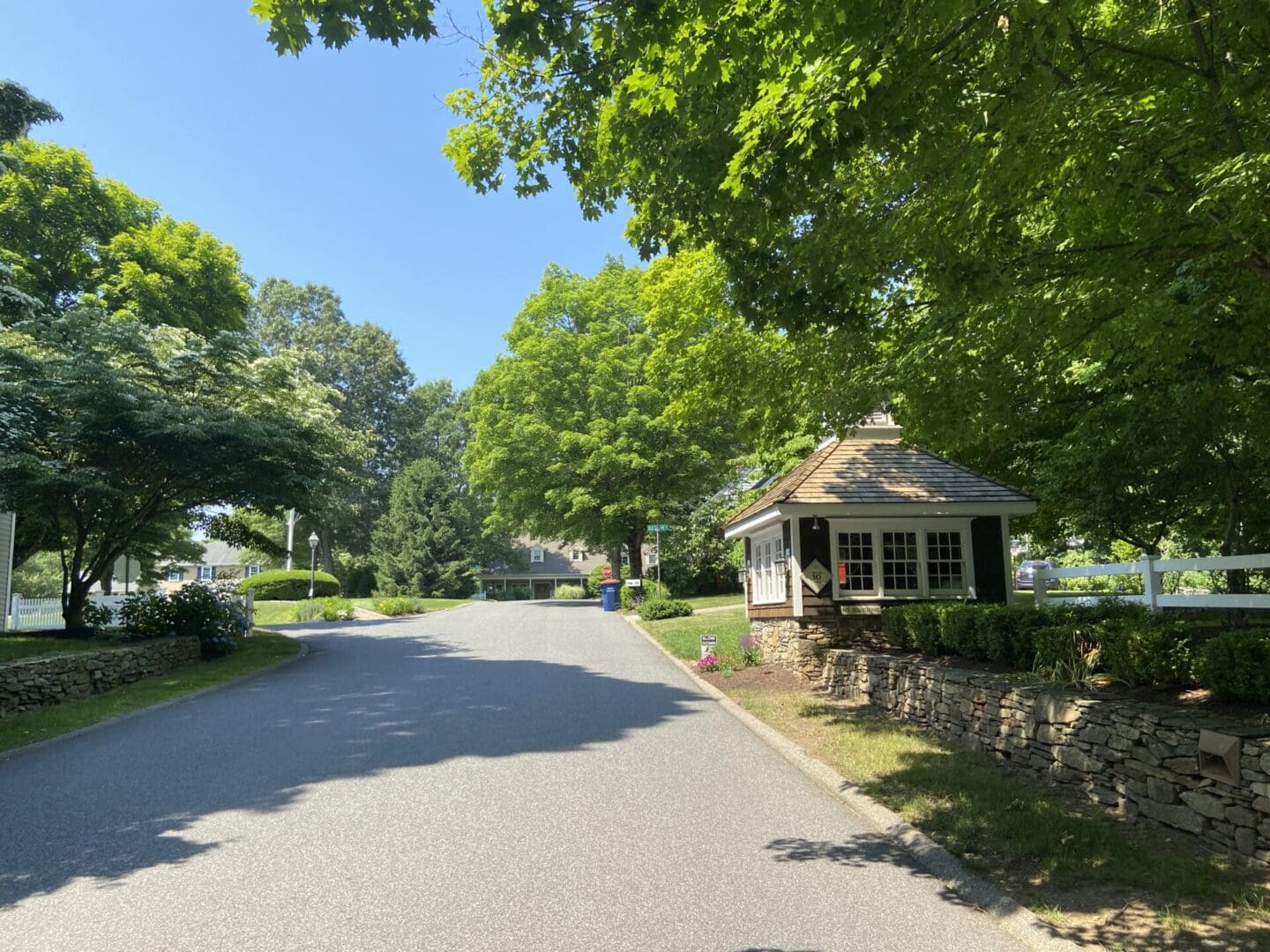 A gated community with a stone wall.