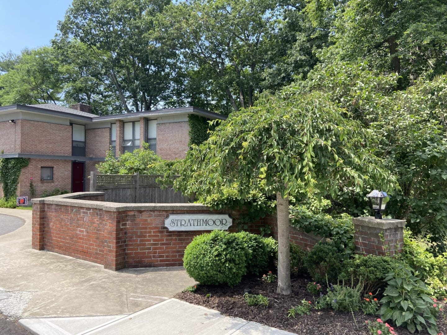 Strathmoor brick apartment building entrance.