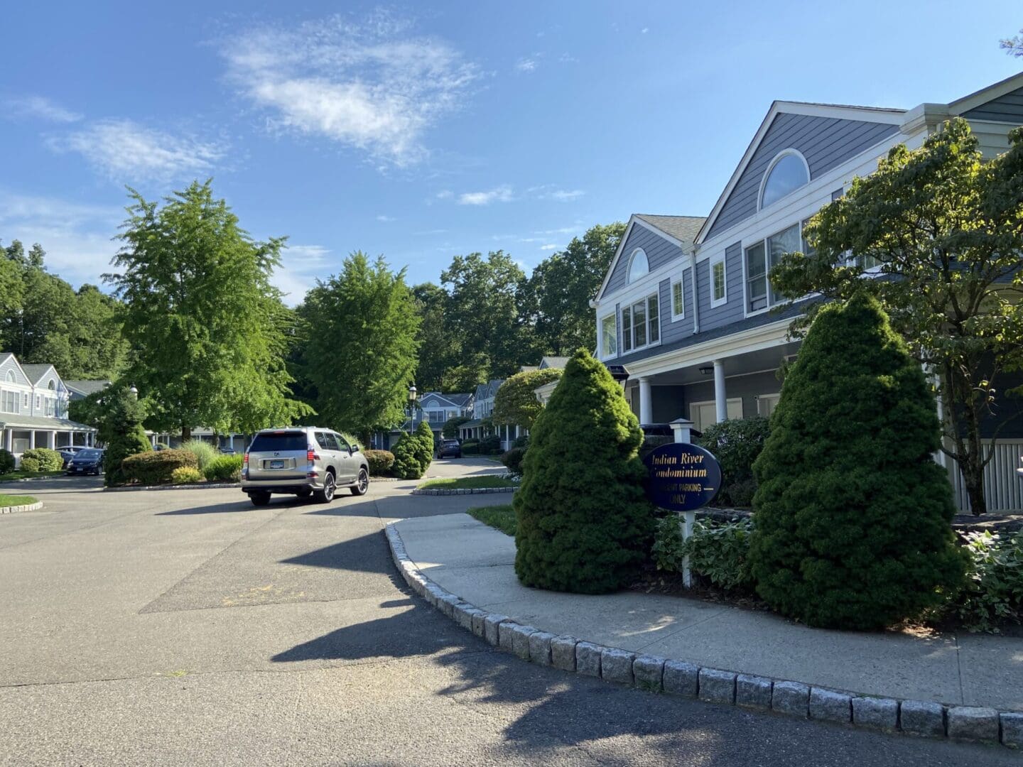 Indian River Condominium, car in driveway.