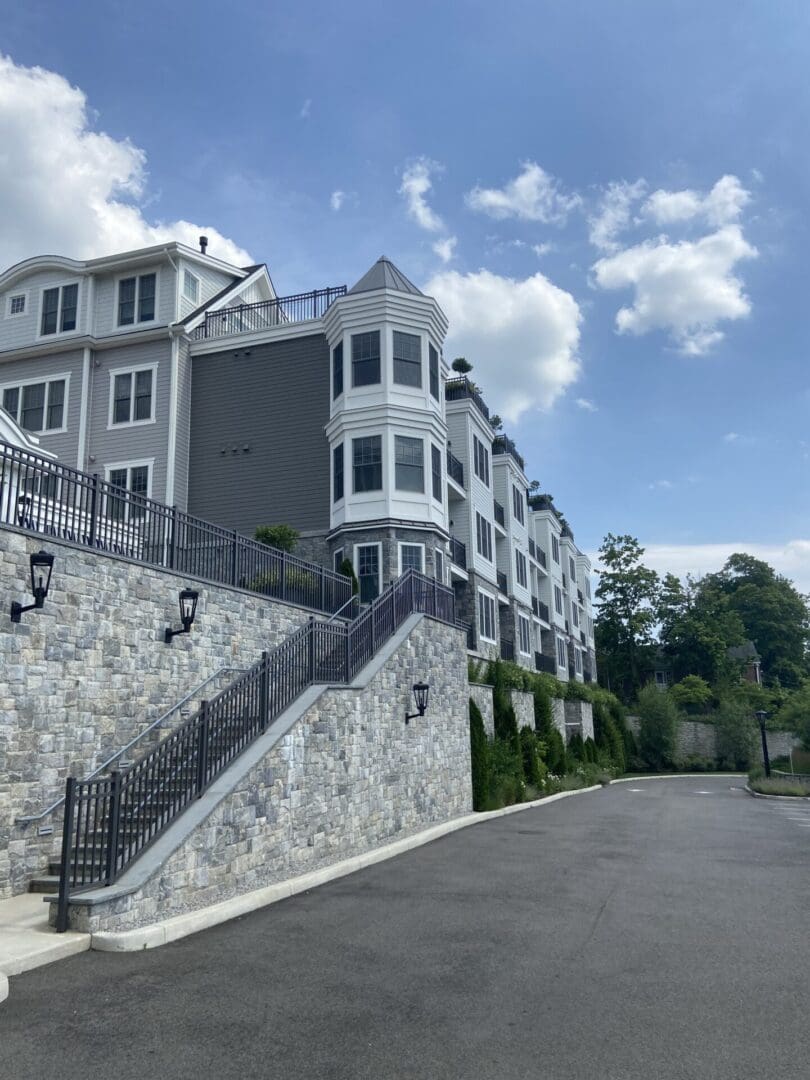 Stone steps leading to an apartment building.