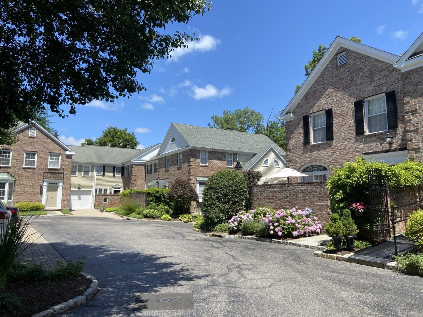 Brick townhouses on sunny day.