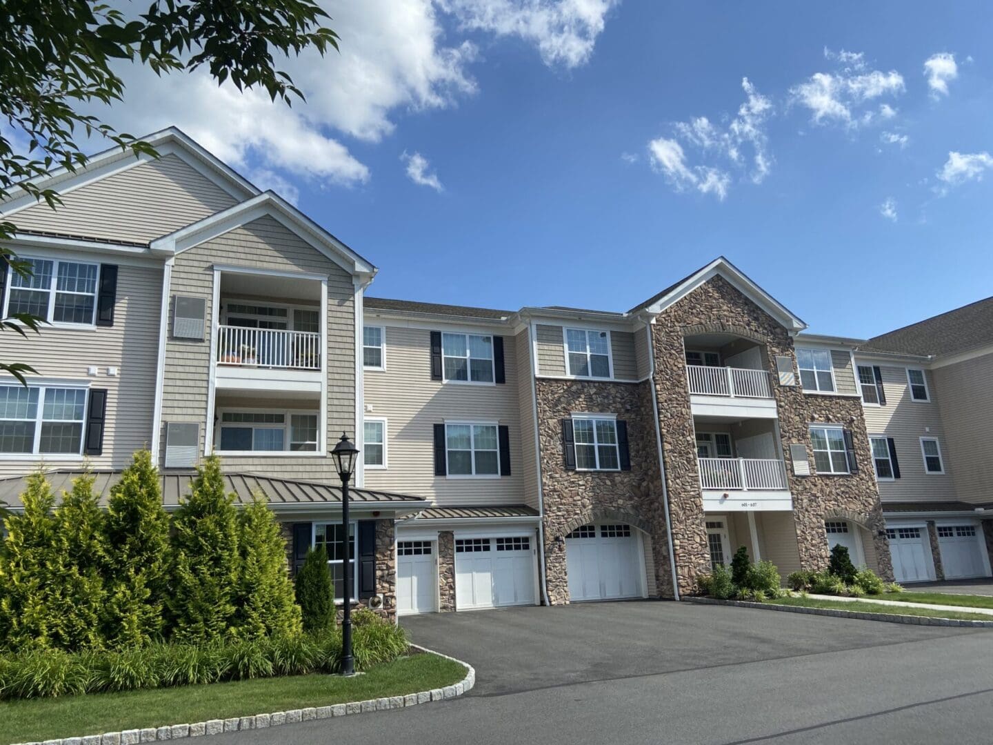 Modern apartment building with garages.