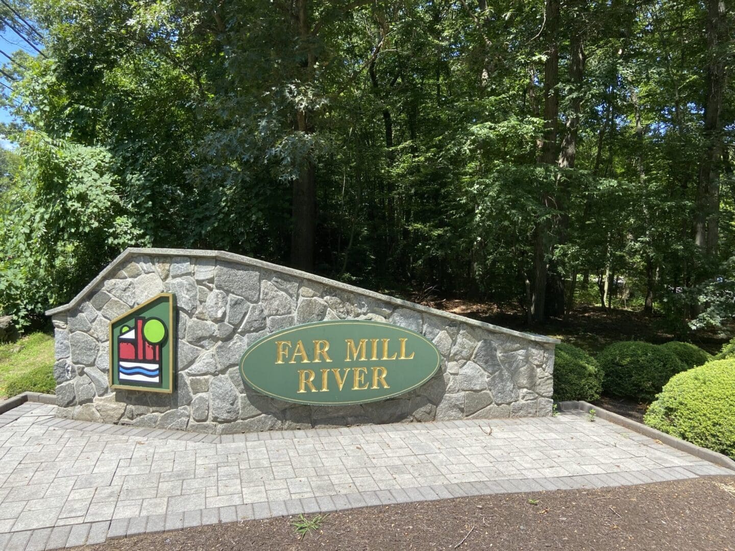 Stone sign for Far Mill River.