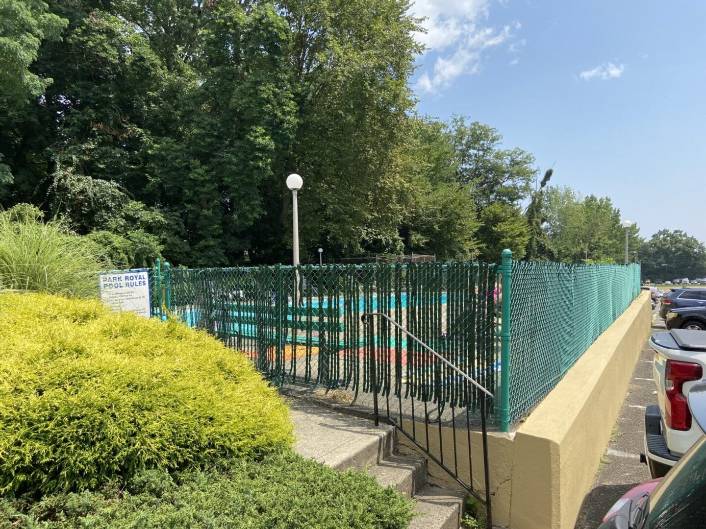 Park Royal pool area with fence.