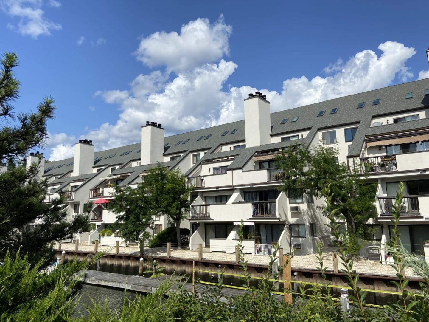 Waterfront townhouses with green roof.